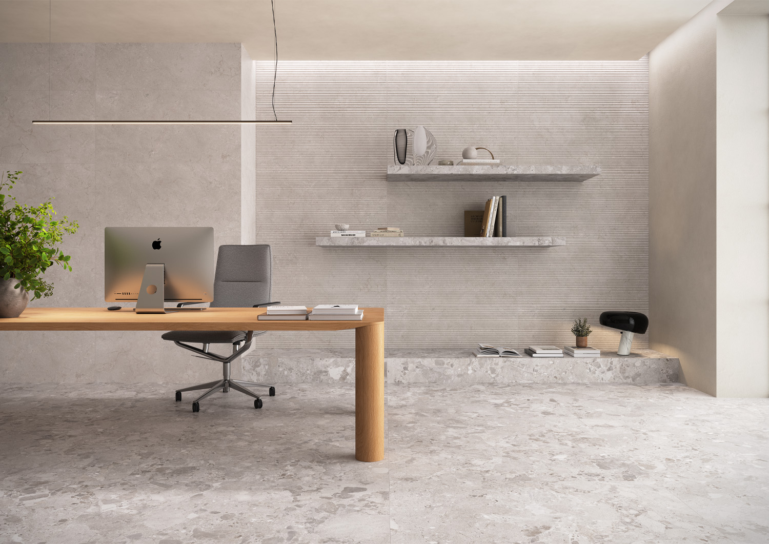 Home office with stone-effect textured porcelain tiles on the wall and floor