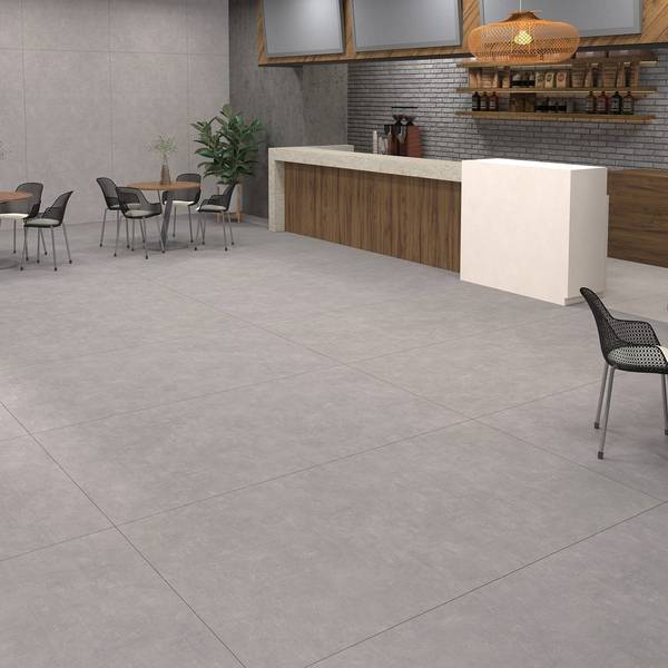 Modern Light Commercial featuring grey tones with porcelain tiles, creating a serene atmosphere.